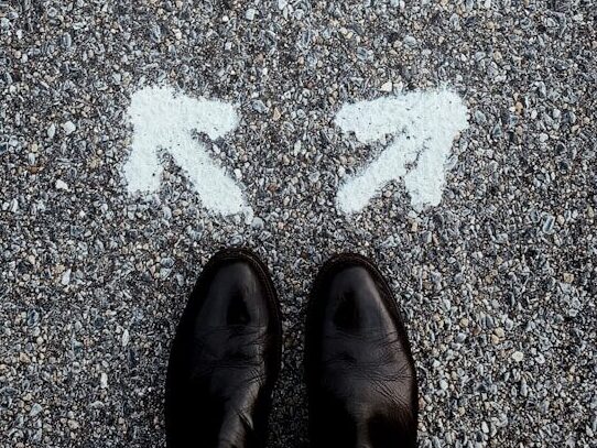 a person standing in the middle of a street